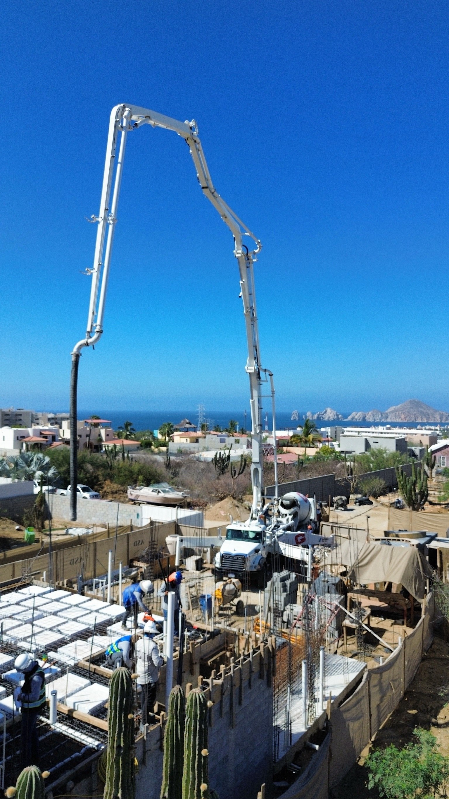 Aerial view of an ASD job site with Land's End in the distance
