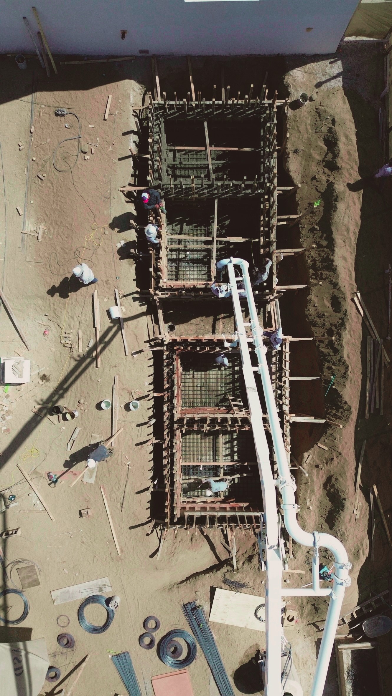 Concrete formwork and rebar wall under construction