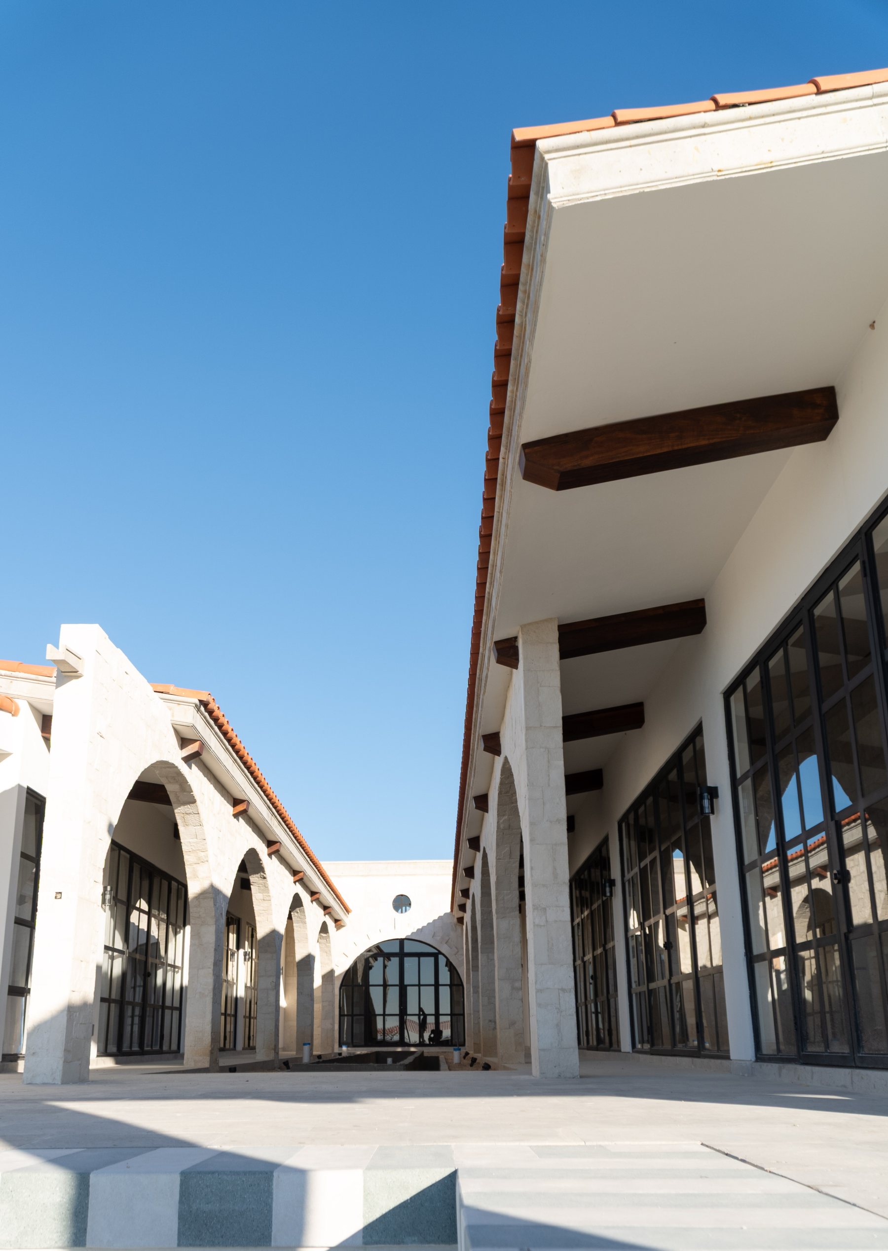 Arched arcade beside the pool