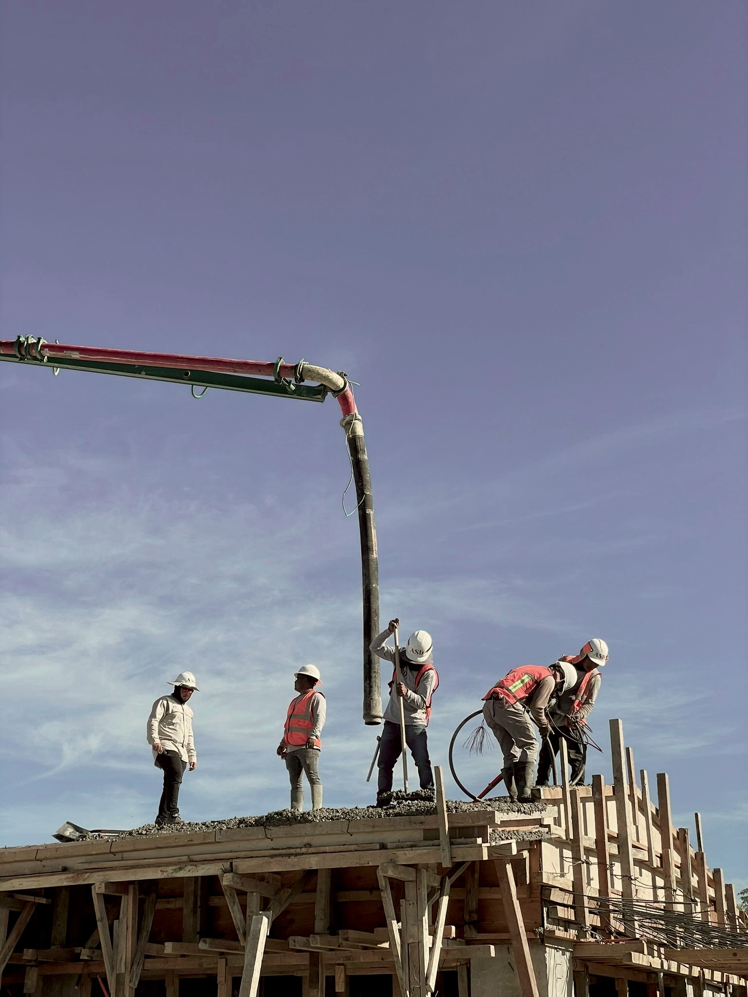 Crew placing rebar for a foundation
